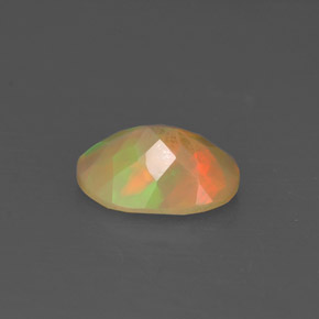 Ópalo multicolor natural de 0,69 ct, transparente, transparente / translúcido