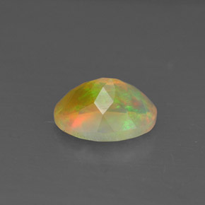 Ópalo multicolor natural de 0,81 ct, transparente, transparente / translúcido