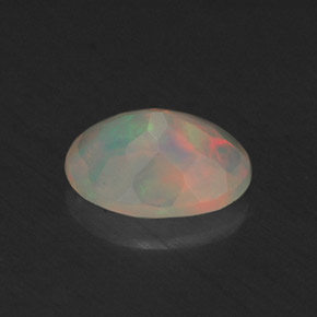 Ópalo multicolor natural de 0,64 ct, transparente, transparente / translúcido