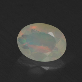 Ópalo multicolor natural de 0,64 ct, transparente, transparente / translúcido