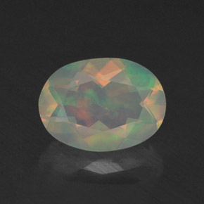 Ópalo multicolor natural de 0,76 ct, transparente, transparente / translúcido