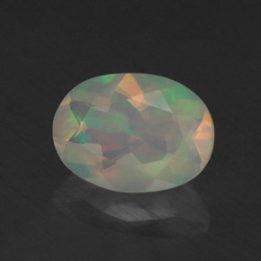 Ópalo multicolor natural de 0,76 ct, transparente, transparente / translúcido