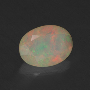 Ópalo multicolor natural de 0,66 ct, transparente, transparente / translúcido
