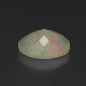 Ópalo multicolor natural de 0,66 ct, transparente, transparente / translúcido