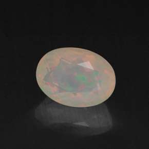 Ópalo multicolor natural de 0,87 ct, transparente, transparente / translúcido