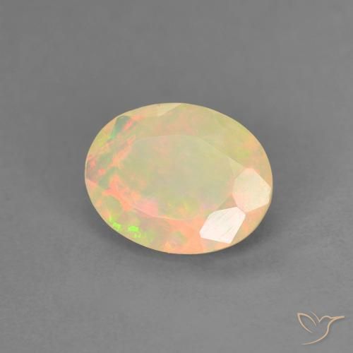 Ópalo Multicolor natural de 0.74 ct, Ovalada, Translúcido
