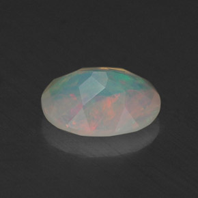 Ópalo multicolor natural de 0,67 ct, transparente, transparente / translúcido