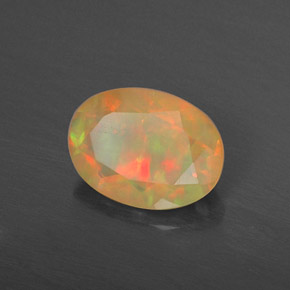 Ópalo multicolor natural de 0,87 ct, corte óvalo, translúcido
