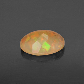 Ópalo multicolor natural de 0,87 ct, corte óvalo, translúcido