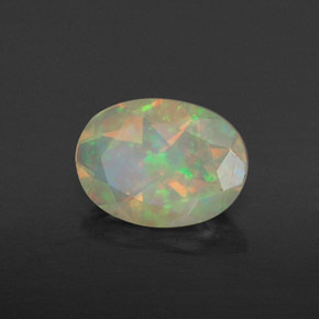 Ópalo multicolor natural de 0,74 ct, transparente, transparente / translúcido