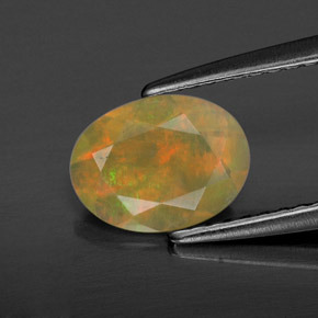 Ópalo multicolor natural de 0,61 ct, transparente, transparente / translúcido