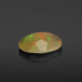 Ópalo multicolor natural de 0,61 ct, transparente, transparente / translúcido