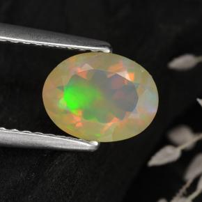 Ópalo multicolor natural de 0,75 ct, corte óvalo, transparente