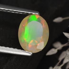 Ópalo multicolor natural de 0,75 ct, corte óvalo, transparente