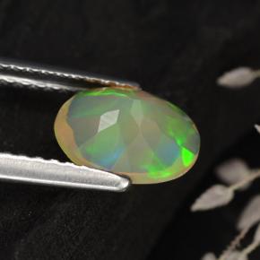 Ópalo multicolor natural de 0,75 ct, corte óvalo, transparente