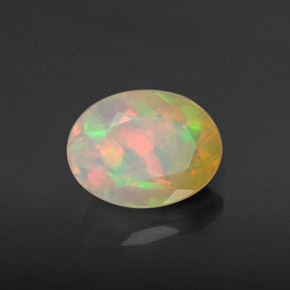Ópalo multicolor natural de 0,87 ct, corte óvalo, translúcido