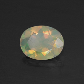 Ópalo multicolor natural de 0,73 ct, corte óvalo, translúcido