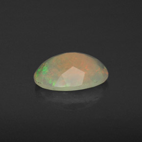 Ópalo multicolor natural de 0,78 ct, transparente, transparente / translúcido
