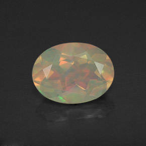 Ópalo multicolor natural de 0,93 ct, corte óvalo, translúcido