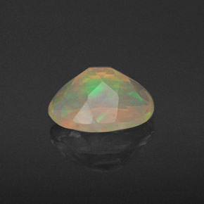 Ópalo multicolor natural de 0,93 ct, corte óvalo, translúcido