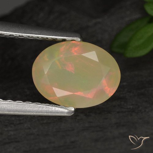 0.79ct Natural Multicolor Ópalo, Ovalada, Translúcido