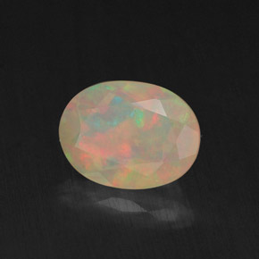 Ópalo multicolor natural de 0,85 ct, transparente, transparente / translúcido