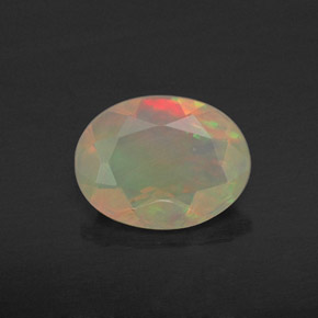 Ópalo multicolor natural de 0,69 ct, transparente, transparente / translúcido