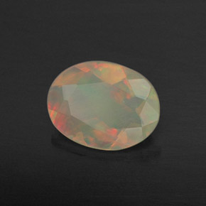 Ópalo multicolor natural de 0,69 ct, transparente, transparente / translúcido