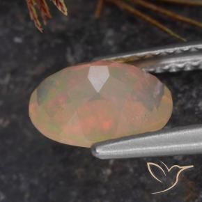 Ópalo Multicolor natural de 0.72 ct, Ovalada, Transparente