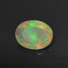 Ópalo multicolor natural de 0,73 ct, transparente, transparente / translúcido
