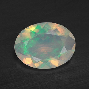 Ópalo multicolor natural de 0,59 ct, transparente, transparente / translúcido