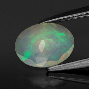 Ópalo multicolor natural de 0,59 ct, transparente, transparente / translúcido