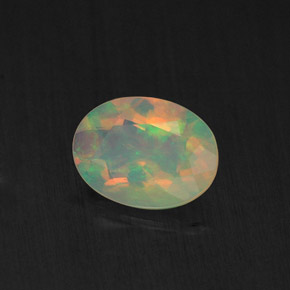 Ópalo multicolor natural de 0,65 ct, transparente, transparente / translúcido