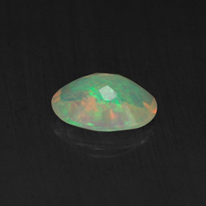 Ópalo multicolor natural de 0,65 ct, transparente, transparente / translúcido