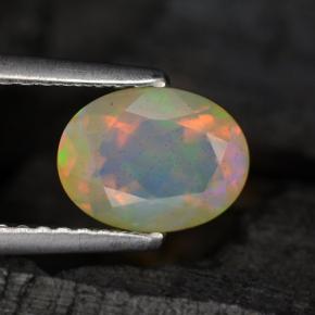 Ópalo multicolor natural de 0,88 ct, corte óvalo, translúcido