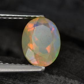 Ópalo multicolor natural de 0,88 ct, corte óvalo, translúcido