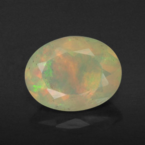 Ópalo multicolor natural de 0,80 ct, corte óvalo, transparente