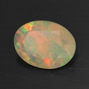 Ópalo multicolor natural de 0,66 ct, transparente, transparente / translúcido