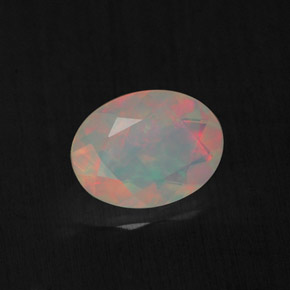 Ópalo multicolor natural de 0,77 ct, transparente, transparente / translúcido
