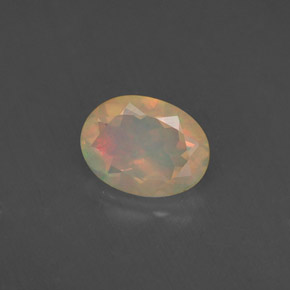 Ópalo multicolor natural de 0,75 ct, transparente, transparente / translúcido
