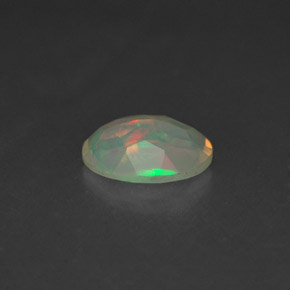 Ópalo multicolor natural de 0,65 ct, transparente, transparente / translúcido