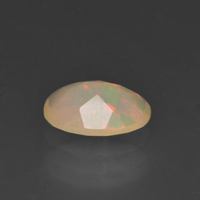 Ópalo multicolor natural de 0,78 ct, corte óvalo, translúcido