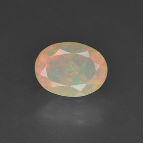 Ópalo multicolor natural de 0,63 ct, corte óvalo, translúcido