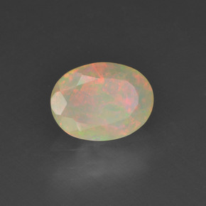 Ópalo multicolor natural de 0,63 ct, corte óvalo, translúcido