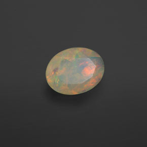 Ópalo multicolor natural de 0,63 ct, transparente, transparente / translúcido