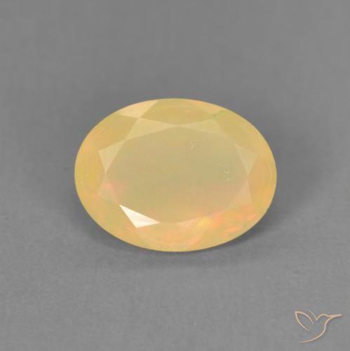 0.76ct Natural Multicolor Ópalo, Ovalada, Translúcido