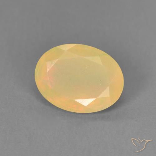 Ópalo Multicolor natural de 0.76 ct, Ovalada, Translúcido