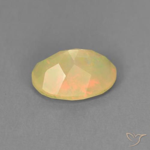 Ópalo Multicolor natural de 0.76 ct, Ovalada, Translúcido