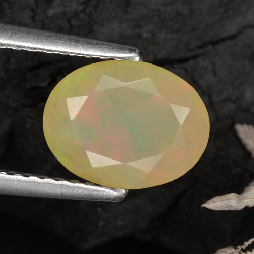 Ópalo multicolor natural de 1,04 ct, corte óvalo, translúcido