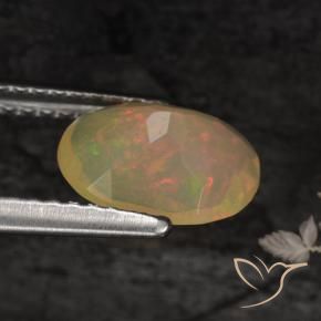 Ópalo Multicolor natural de 0.86 ct, Ovalada, Translúcido
